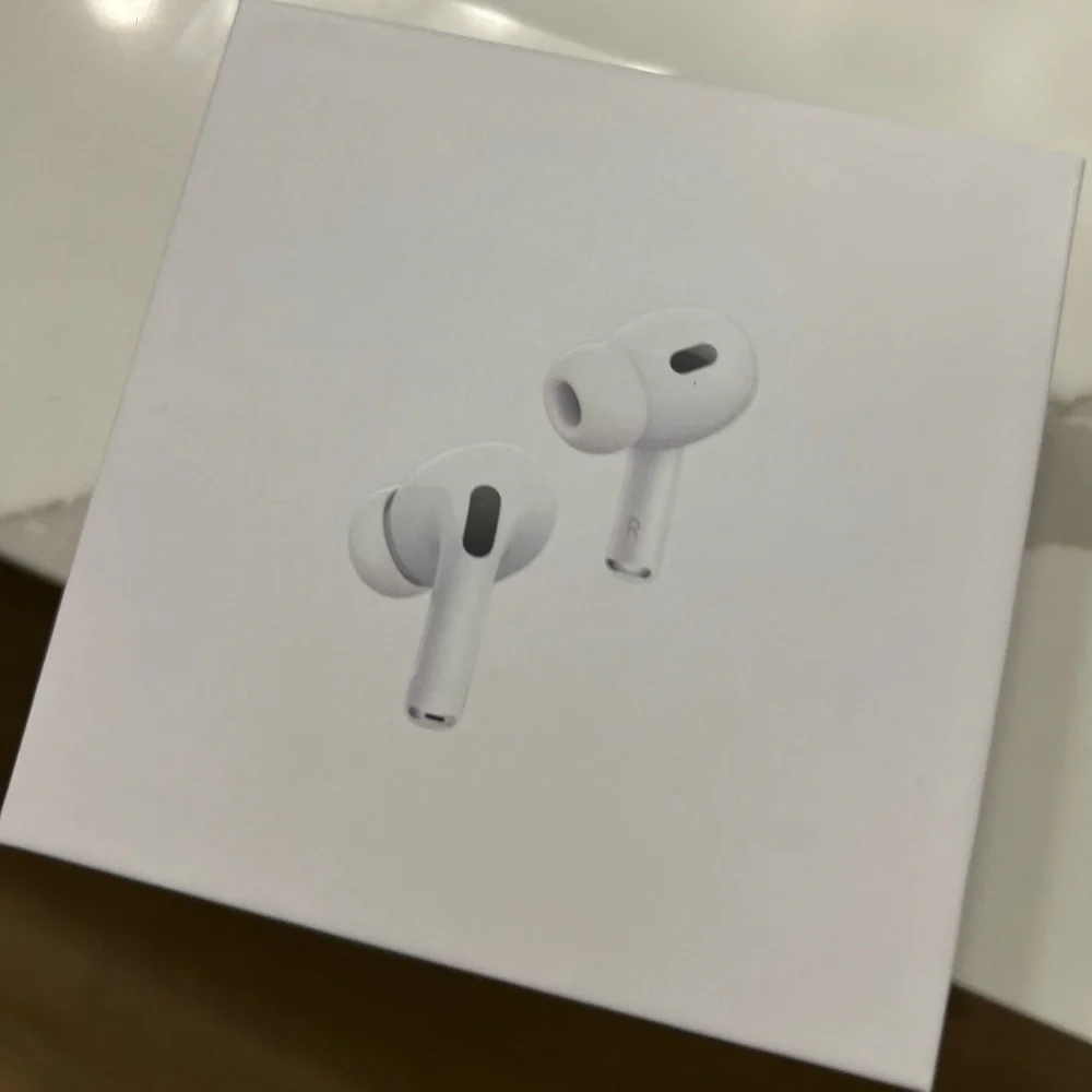 Apple AirPods with Wireless Charging Case - White